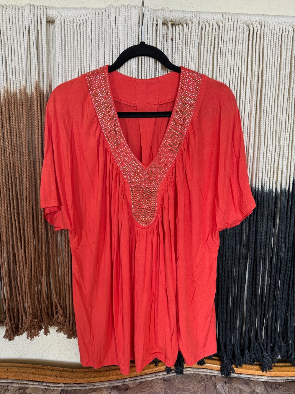 Peachy orange rhinestone v neck top; excellent condition